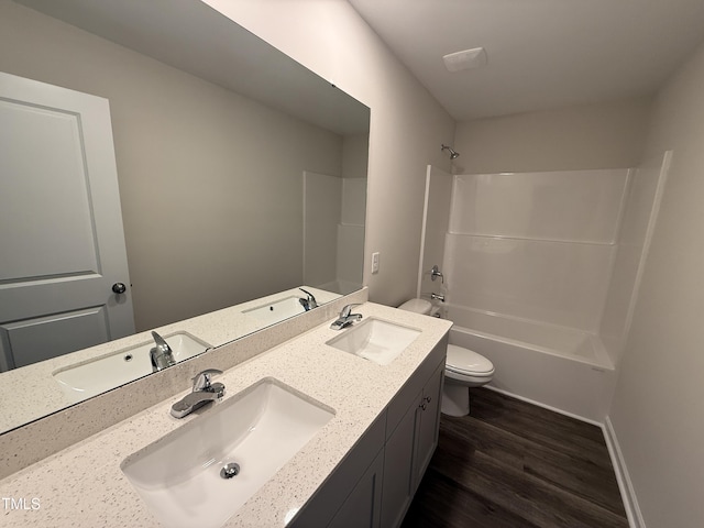 43 Chloe Ct, Selma, NC 27576 - bathroom with double vanity, wood finished floors, and shower / tub combination