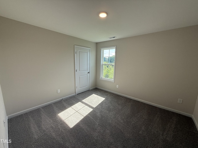 43 Chloe Ct, Selma, NC 27576 - carpeted empty room with baseboards