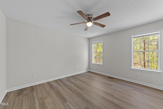 5408 Rivercrest Dr, Youngsville, NC 27596 - empty room featuring baseboards, ceiling fan, and wood finished floors