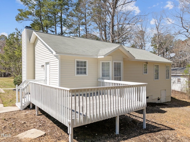 5408 Rivercrest Dr, Youngsville, NC 27596 - exterior space with crawl space, a chimney, a shingled roof, and a deck