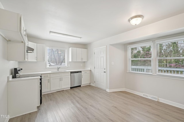 kitchen featuring electric range, white cabinets, visible vents, stainless steel dishwasher, and a sink
