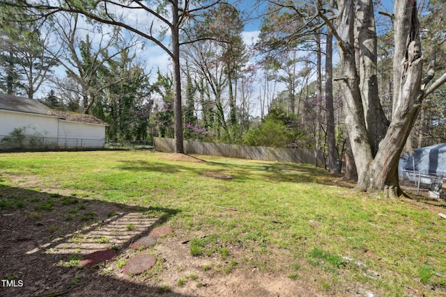view of yard with fence
