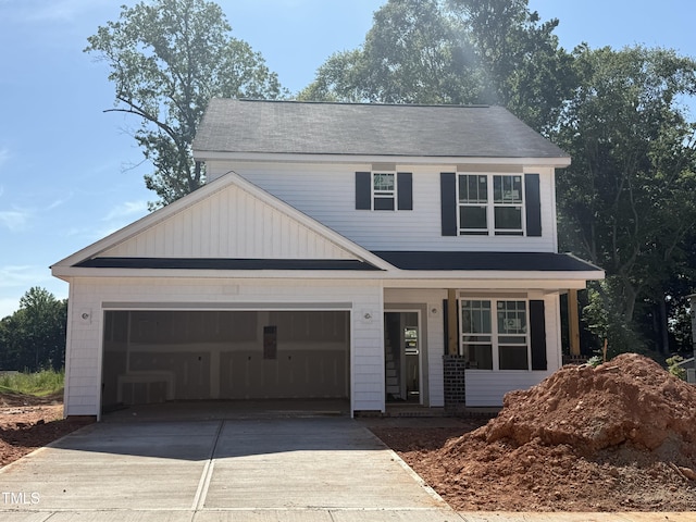 35 Fetterbush Way, Clayton, NC 27520 - view of front of house with driveway, a porch, and a garage