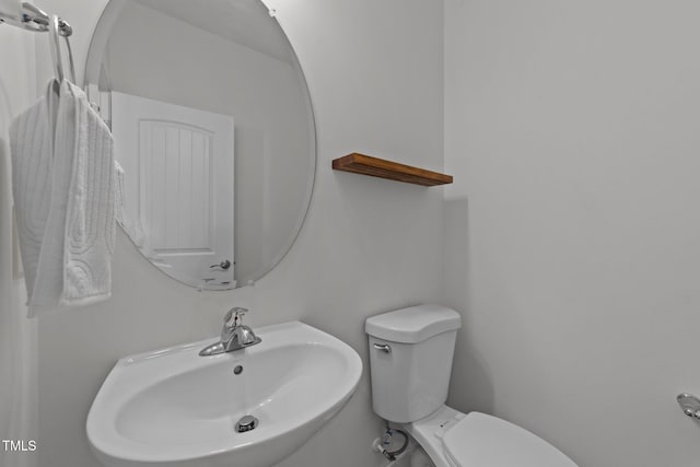 1408 Weavers Trace Dr, Zebulon, NC 27597 - bathroom featuring toilet and a sink