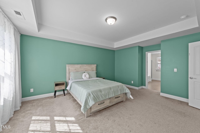 1408 Weavers Trace Dr, Zebulon, NC 27597 - carpeted bedroom featuring baseboards and visible vents