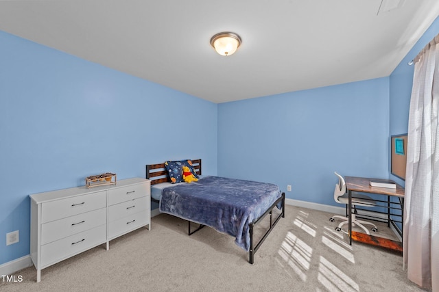 1408 Weavers Trace Dr, Zebulon, NC 27597 - bedroom with light carpet and baseboards