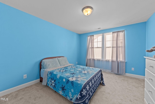 1408 Weavers Trace Dr, Zebulon, NC 27597 - bedroom featuring baseboards, visible vents, and carpet