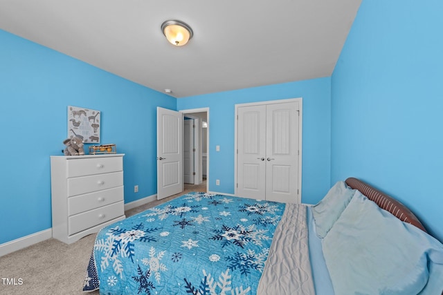 1408 Weavers Trace Dr, Zebulon, NC 27597 - carpeted bedroom featuring a closet and baseboards