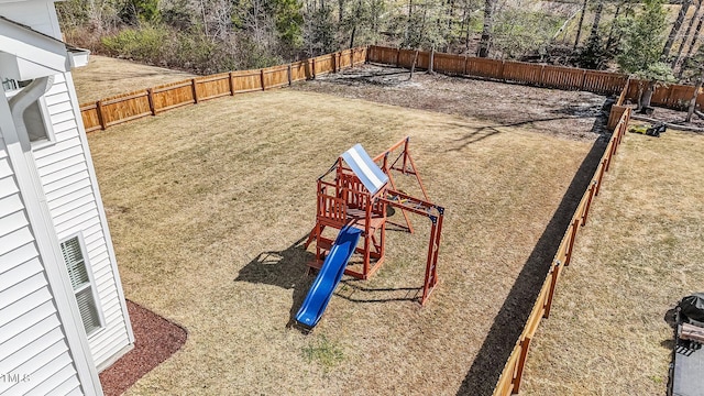 1408 Weavers Trace Dr, Zebulon, NC 27597 - view of yard with a fenced backyard and a playground
