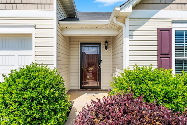 1004 Gold Cir, Mebane, NC 27302 - view of exterior entry featuring a garage