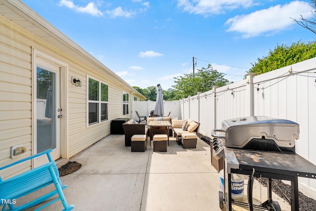 1004 Gold Cir, Mebane, NC 27302 - view of patio with an outdoor living space, a fenced backyard, and outdoor dining area