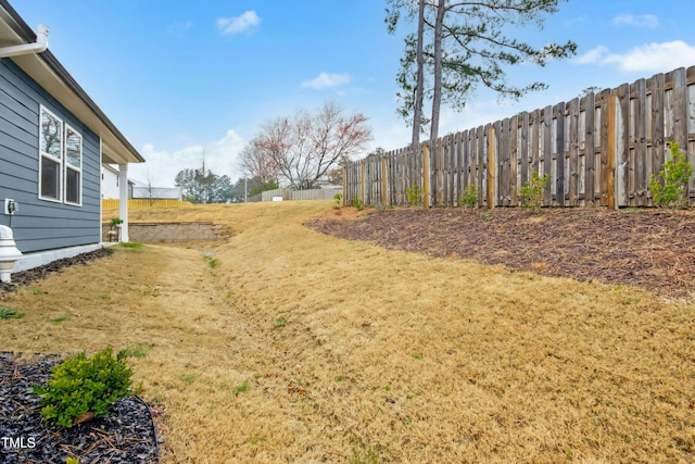 view of yard with fence