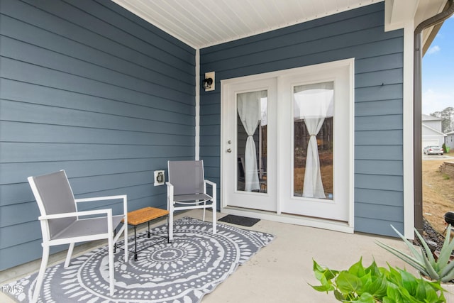 view of patio featuring a porch