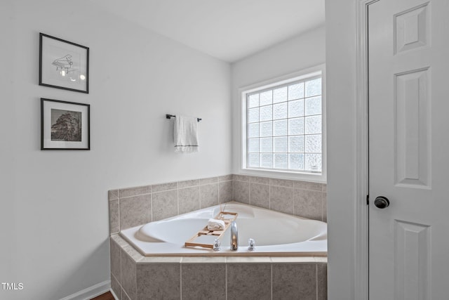 bathroom featuring a bath