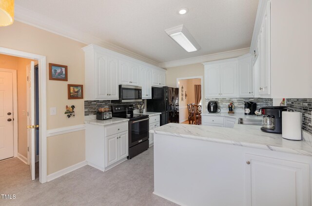 608 Adler Ln, Goldsboro, NC 27530 - kitchen featuring white cabinetry, light stone countertops, a peninsula, black appliances, and ornamental molding