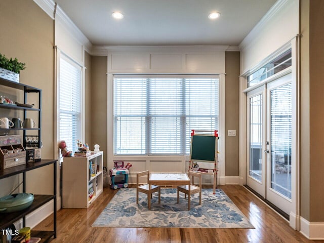 107 Bella Casa Way, Clayton, NC 27527 - living area with recessed lighting, wood finished floors, and ornamental molding