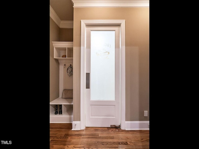 107 Bella Casa Way, Clayton, NC 27527 - mudroom featuring crown molding, baseboards, and wood finished floors