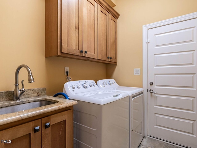 107 Bella Casa Way, Clayton, NC 27527 - laundry area featuring cabinet space, a sink, and washer and clothes dryer