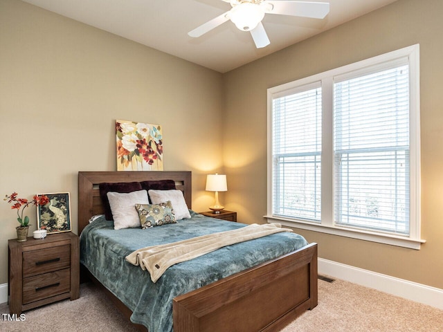 107 Bella Casa Way, Clayton, NC 27527 - carpeted bedroom featuring baseboards and a ceiling fan