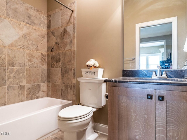 107 Bella Casa Way, Clayton, NC 27527 - bathroom with toilet, vanity, tub / shower combination, and baseboards