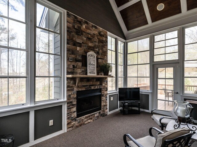 107 Bella Casa Way, Clayton, NC 27527 - interior space with a fireplace, carpet, vaulted ceiling, and a wealth of natural light