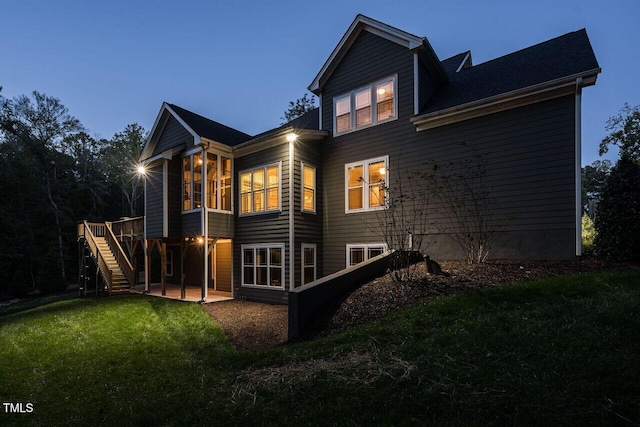 107 Bella Casa Way, Clayton, NC 27527 - rear view of property with a lawn, a deck, a patio, and stairway