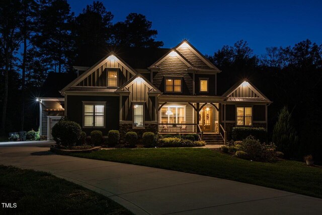 107 Bella Casa Way, Clayton, NC 27527 - craftsman-style home featuring a porch, board and batten siding, and a yard