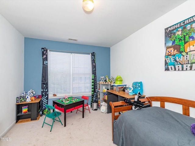 bedroom featuring carpet floors and baseboards