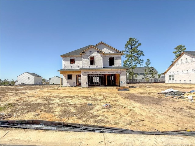 unfinished property with fence