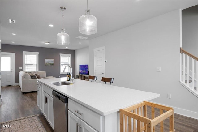 305 Wash Hollow Dr, Wendell, NC 27591 - kitchen with stainless steel dishwasher, white cabinets, dark wood finished floors, and a sink