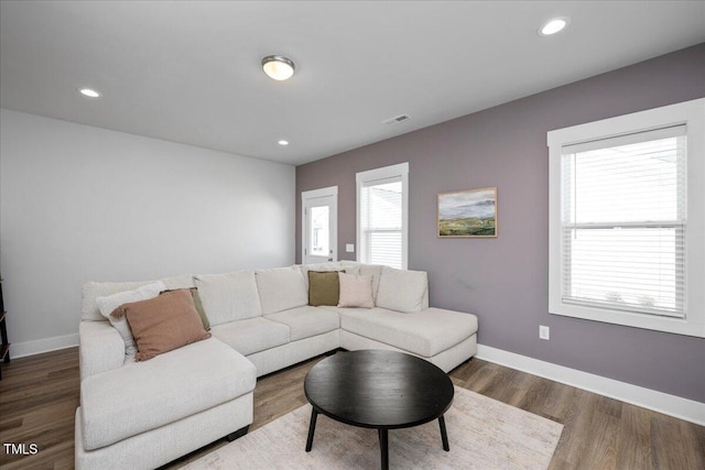 305 Wash Hollow Dr, Wendell, NC 27591 - living room featuring wood finished floors, recessed lighting, baseboards, and visible vents