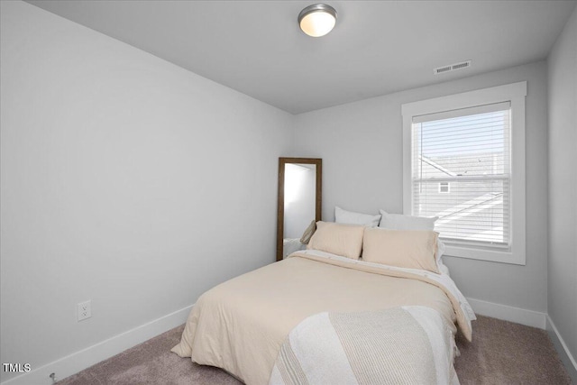 305 Wash Hollow Dr, Wendell, NC 27591 - carpeted bedroom with baseboards and visible vents