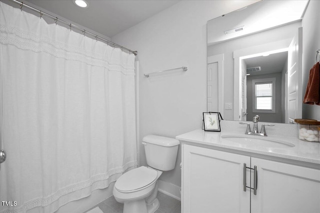 305 Wash Hollow Dr, Wendell, NC 27591 - bathroom with visible vents, toilet, tile patterned flooring, and vanity