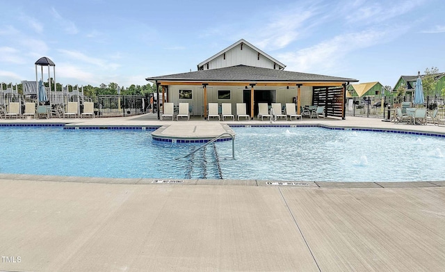 305 Wash Hollow Dr, Wendell, NC 27591 - pool featuring a patio and fence