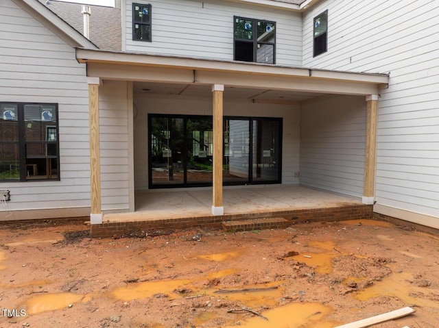 5107 Hearth Dr, Raleigh, NC 27609 - doorway to property with a patio area