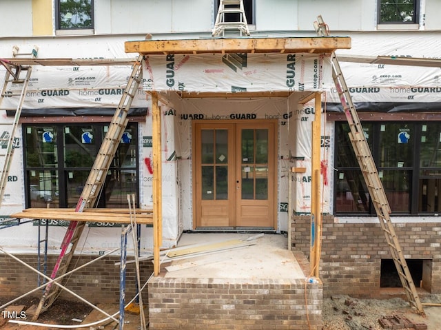 5107 Hearth Dr, Raleigh, NC 27609 - doorway to property featuring french doors