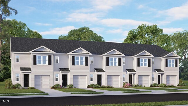 146 Holton St, Smithfield, NC 27577 - view of property featuring a garage