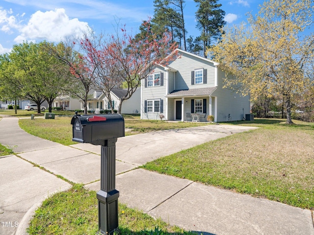 106 Mingocrest Dr, Knightdale, NC 27545 - view of front of property with central AC unit and a front yard