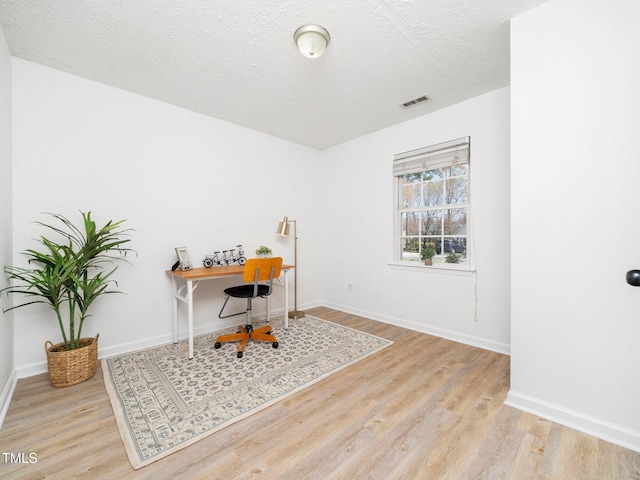 106 Mingocrest Dr, Knightdale, NC 27545 - office with baseboards, visible vents, wood finished floors, and a textured ceiling