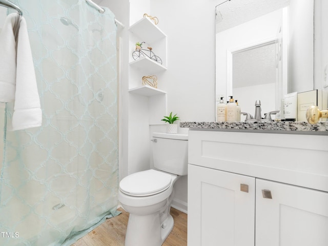 106 Mingocrest Dr, Knightdale, NC 27545 - full bathroom featuring vanity, toilet, a textured ceiling, curtained shower, and wood finished floors