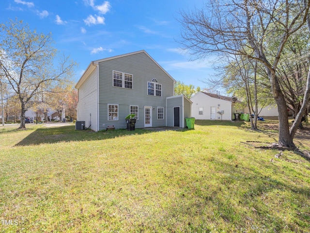 106 Mingocrest Dr, Knightdale, NC 27545 - rear view of house featuring central air condition unit and a yard