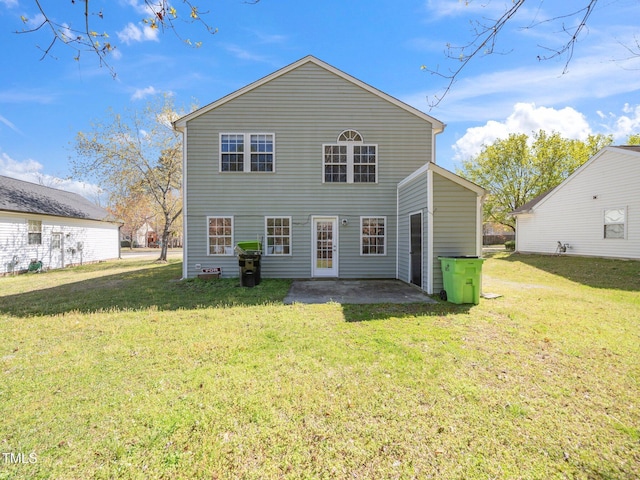 106 Mingocrest Dr, Knightdale, NC 27545 - rear view of property with a lawn and a patio area