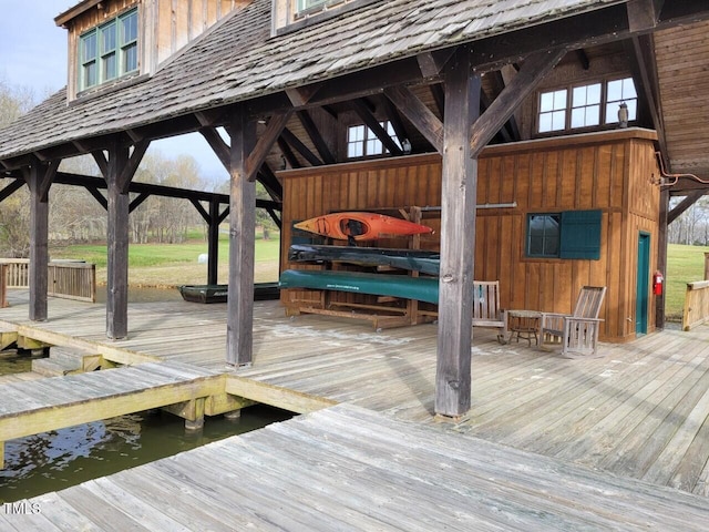 view of dock with a wooden deck