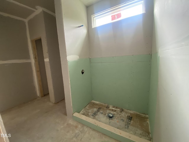 bathroom with concrete floors