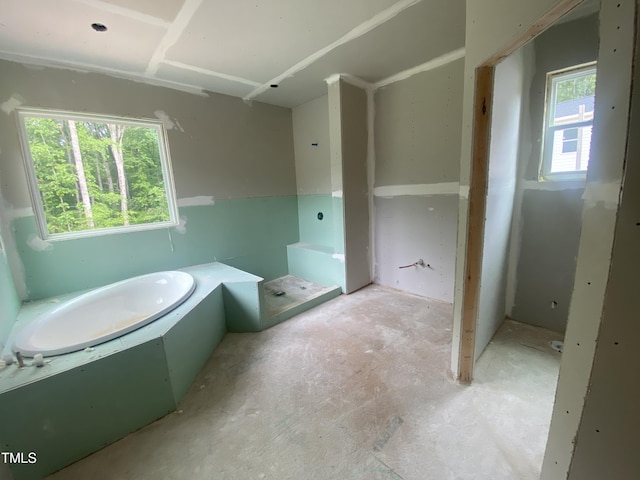 full bath featuring a garden tub