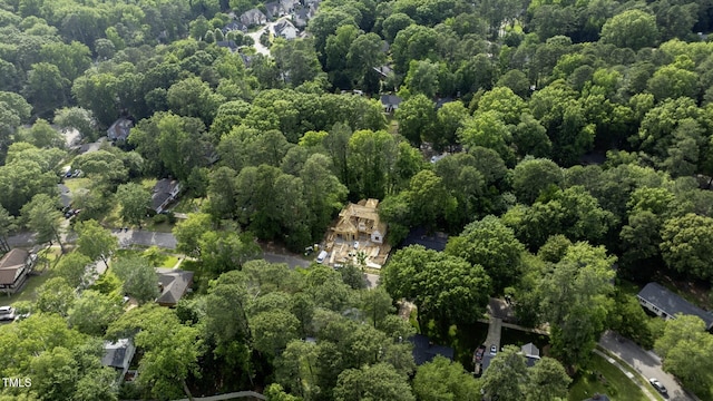 5205 Quail Meadows Dr, Raleigh, NC 27609 - aerial view of property's location with a heavily wooded area