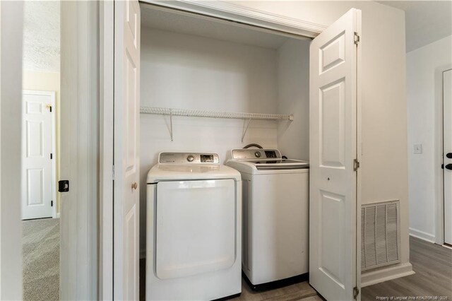 131 Windsor Ln, Raeford, NC 28376 - washroom with washer and dryer and wood finished floors