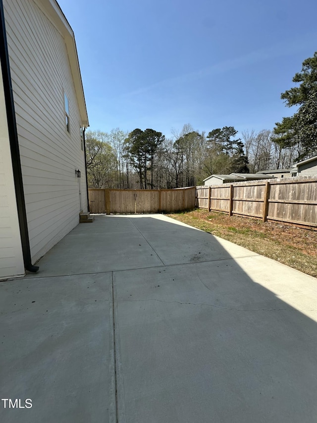 view of patio with a fenced backyard