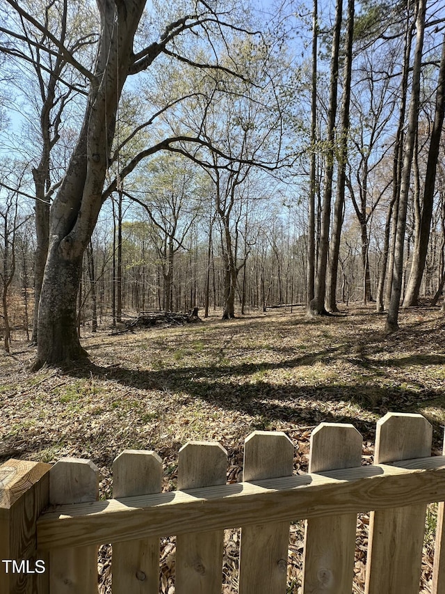 view of yard featuring a view of trees