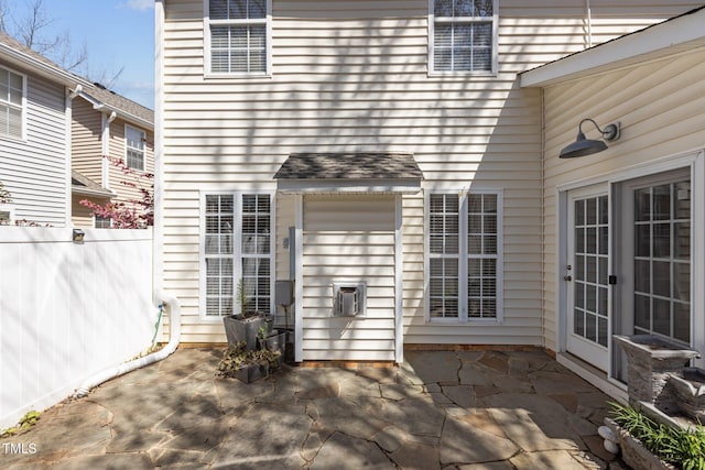 view of patio featuring fence